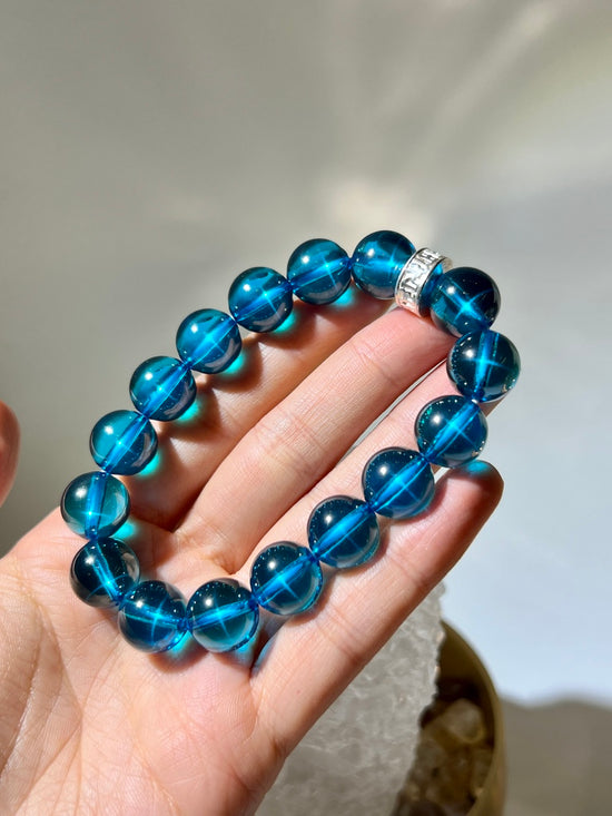 blue-topaz-nagaseye-bracelet-12mm