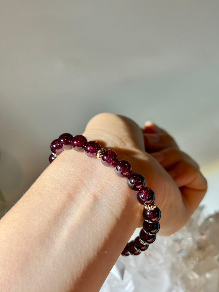 紫牙烏石榴石 (亮紫紅)