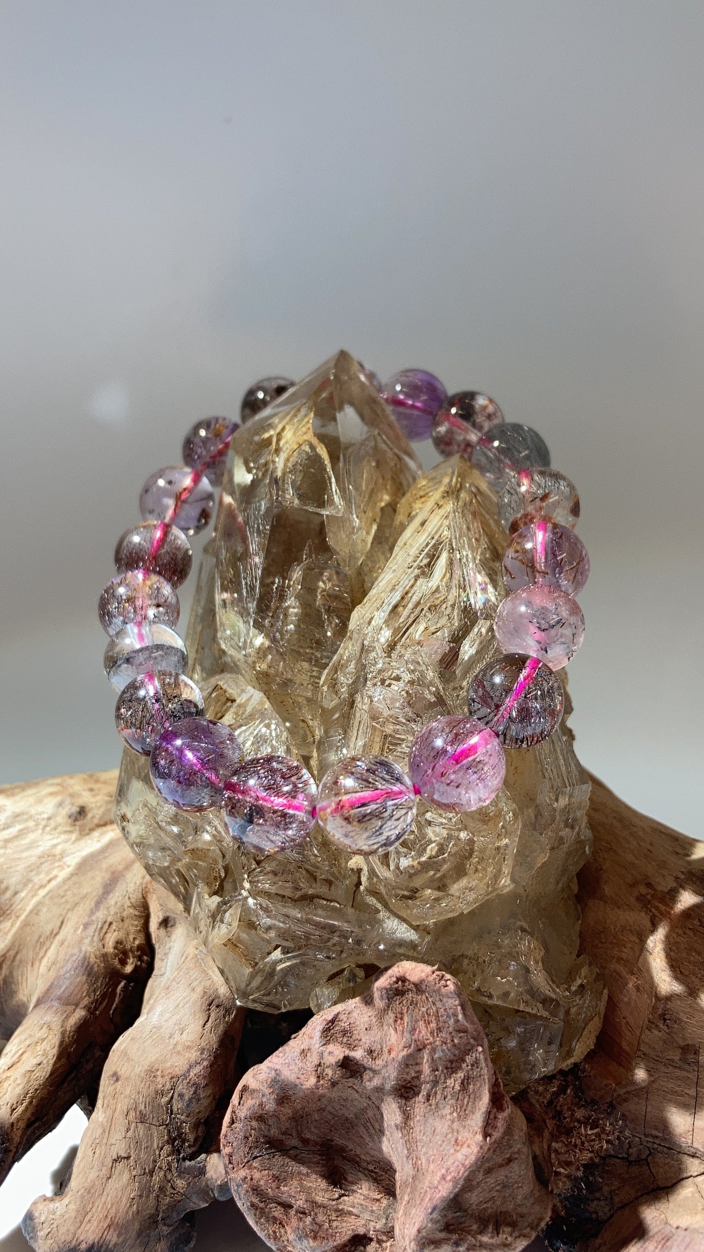 清透高頻骸骨水晶(連木雕底座)