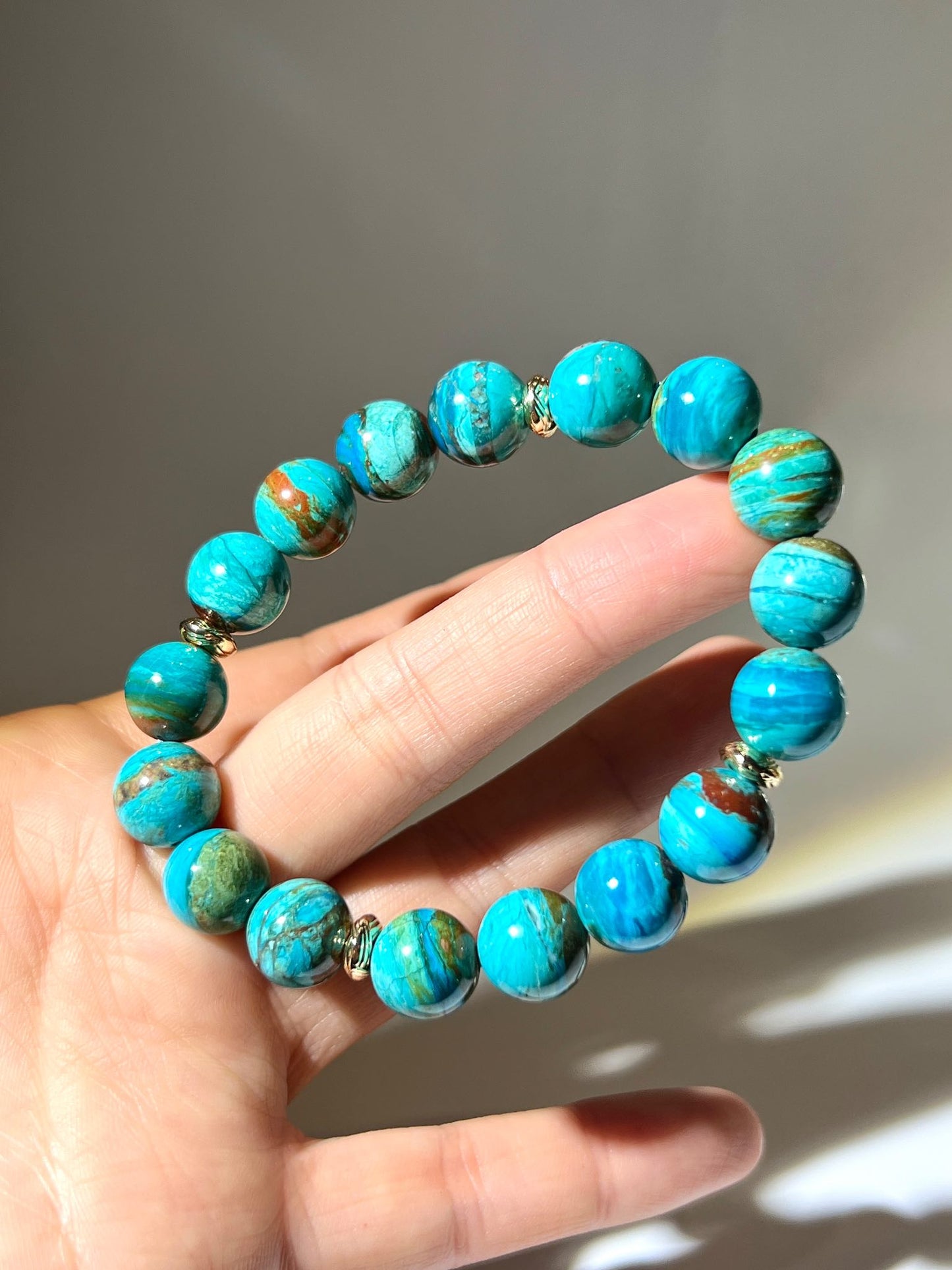 高級 Blue Peruvian Opal，象徵希望與安定之力