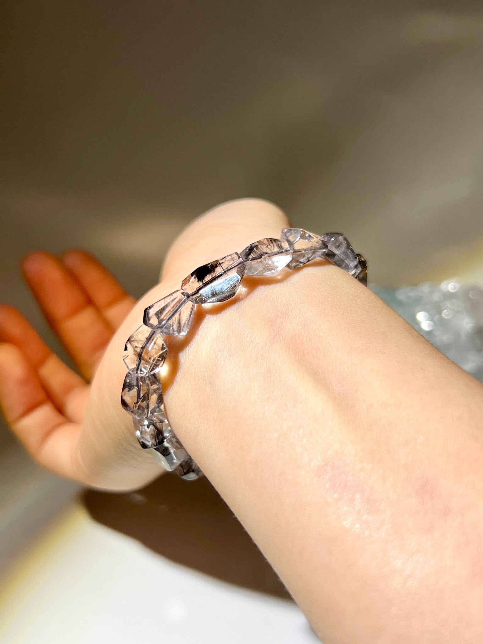 黑銀鈦 黑銀鈦有什麼功效 黑銀鈦功效 黑銀鈦水晶 黑銀鈦手鏈 南無水晶 brookite quartz