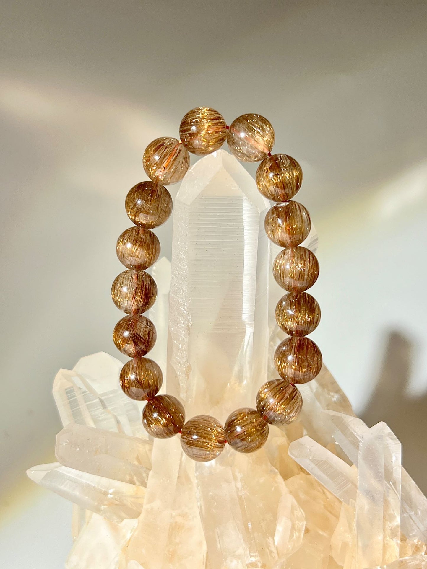 什麼是銅髮晶 髮晶有什麼功效 銅髮晶 紅銅髮 紅髮晶 rutilated quartz 南無水晶