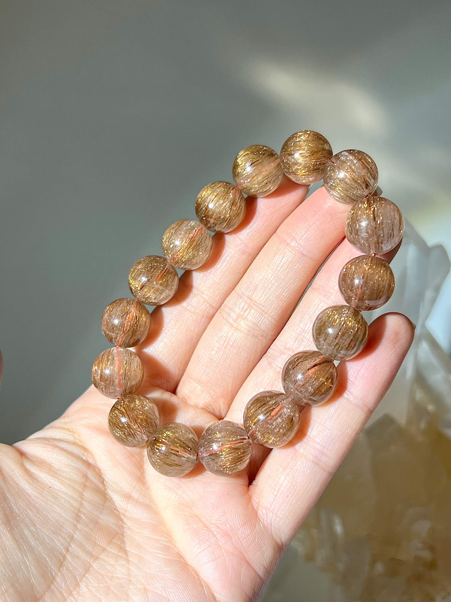 什麼是銅髮晶 髮晶有什麼功效 銅髮晶 紅銅髮 紅髮晶 rutilated quartz 南無水晶 銅髮水晶