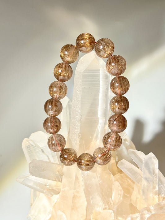 什麼是銅髮晶 髮晶有什麼功效 銅髮晶 紅銅髮 紅髮晶 rutilated quartz 南無水晶 順髮銅髮晶 招財