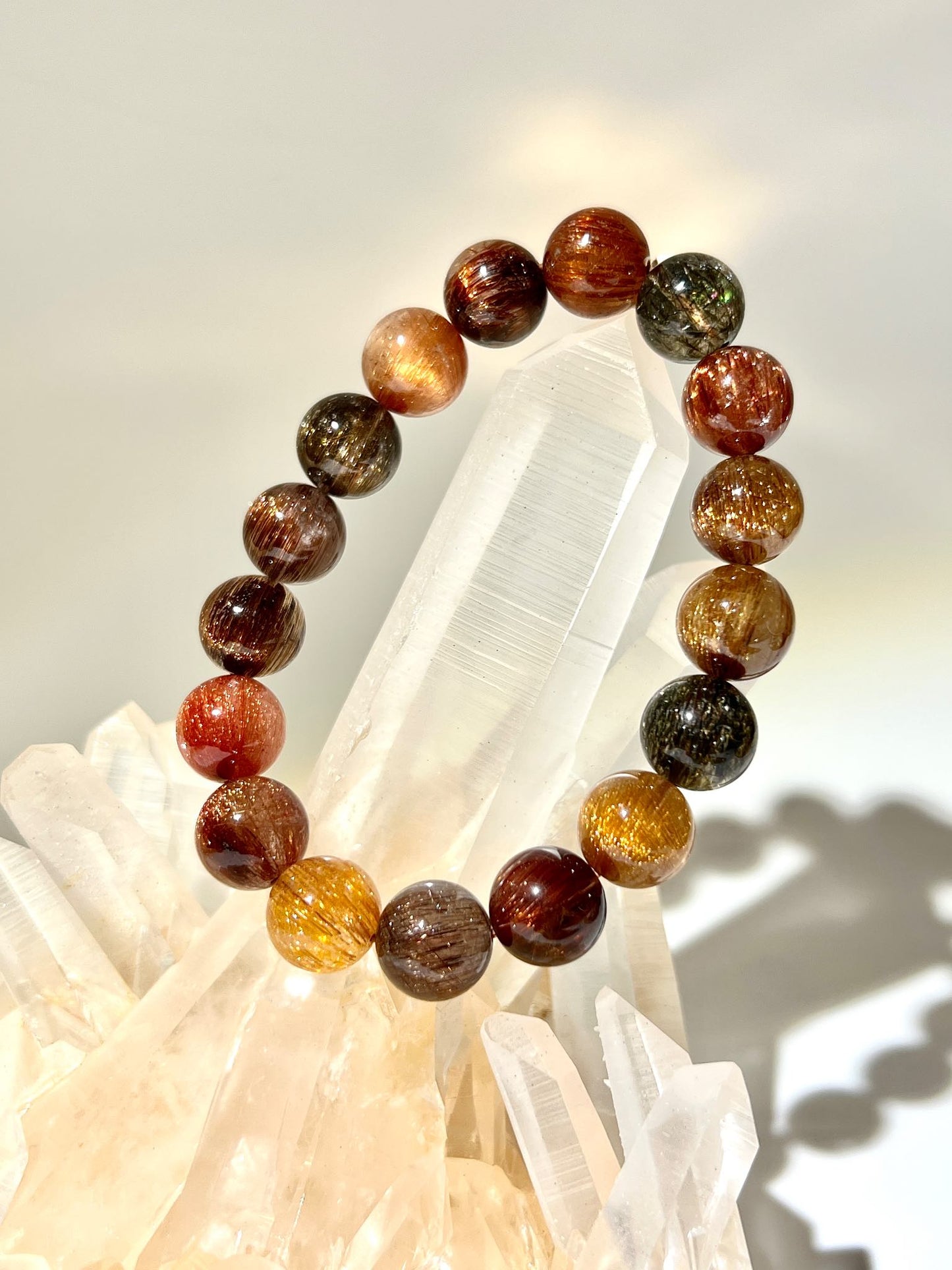 金髮晶 彩髮晶 貓眼髮晶 紅髮晶 銅髮晶 咖啡銅髮晶 銅髮晶功效 rutilated quartz