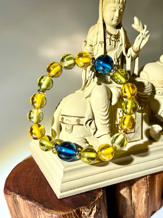 藍色水龍珠 黃色水龍珠 組成的能量手串，象徵決心、行動力與專注力